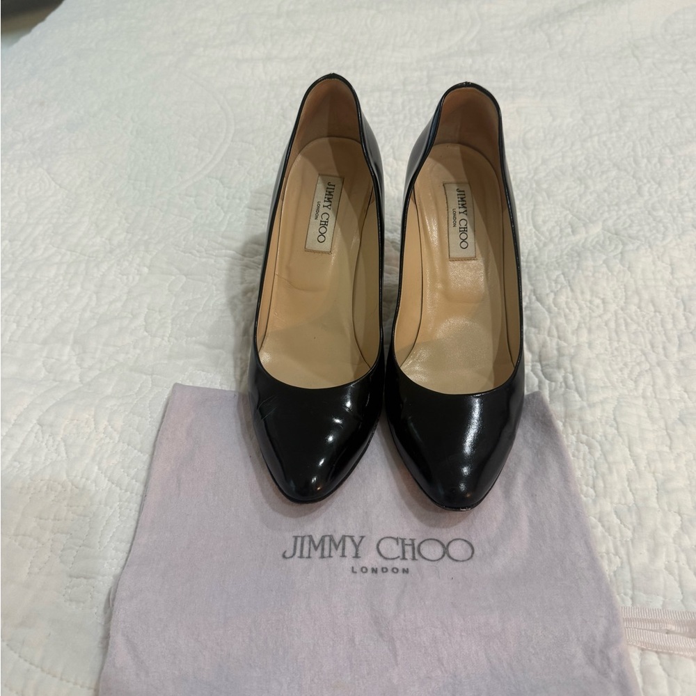 Jimmy Choo Black Patent Leather Heels .
